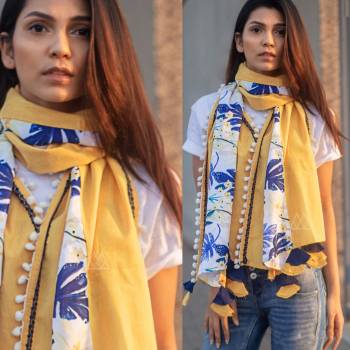 Give A Lovely Enhanced Look To Your Attire By Paring It With This Beautiful Scarf Fabricated On Khadi Cotton. This Scarf Is Beautified With Prints And Tassels. Also It Can Be Paired With Western Top, One Piece Or Kurti. Buy Now.