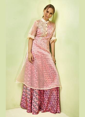 Look Pretty Wearing This Designer Readymade Gown In Pink Color Fabricated On Satin Beautified With Prints Paired With Orgenza Based Top With Embroidery. 