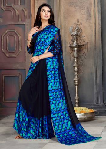 For A Bold and Beautiful Look, Grab This Georgette Based Saree In Navy Blue Color Paired With Navy Blue Colored Blouse. It Has Pretty Satin Patta With Polka Prints Over Border. 