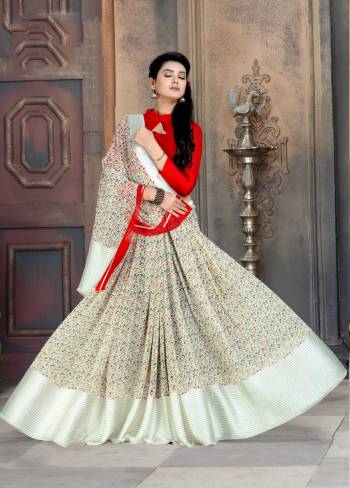 Simple And Elegant Looking Printed Saree In Here In Off-White Color Paired With Red Colored Blouse. This Saree And Blouse Are Georgette Based Beautified With Satin Patta And Intricate Prints All Over.