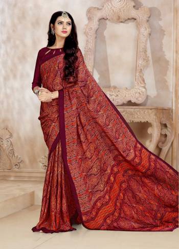 A Royal Color Is Here With This Saree In Maroon Color Paired With Maroon Colored Blouse. This Saree And Blouse Are Fabricated On Satin Georgette Beautified With Intricate Prints All Over It. 