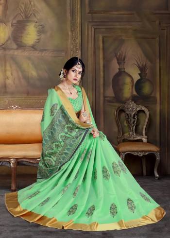 For A Proper Traditional Look, Grab This Pretty Saree In Green Color Paired With Green Colored Blouse. This Saree And Blouse Are Fabricated On Art Silk Beautified With Bold Floral Prints All Over