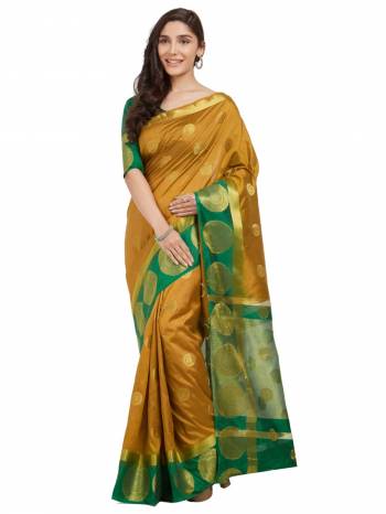 Celebrate This Festive Season With This Saree In Musturd Yellow And Green Color Paired With Green Colored Blouse. This Saree And Blouse Are Fabricated On Nylon Silk Beautified With Weave All Over. 