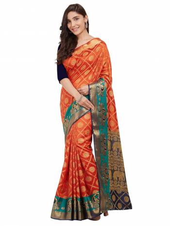 Shine Bright With This Attractive Looking orange And Navy Blue Colored Saree Paired With Navy Blue Colored Blouse. This Saree And Blouse Are Fabricated on Nylon Silk Beautified with Weave All Over. 