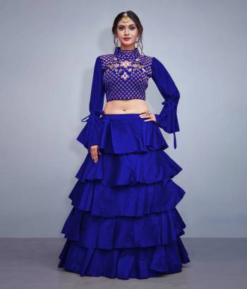 Get Ready For the Upcoming Festive And Wedding Season With This Designer Lehenga And Choli In Black. It Is Fabricated On Art Silk With Heavy Embroidered Blouse And Pattern Play. 