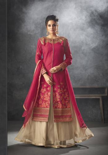 Shine Bright In This Designer Indo-Western Dress In Dark Pink Colored Top And Dupatta Paired With Cream Colored Lehenga. Its Top Is Silk Based Paired With Net Lehenga And Chiffon Dupatta. This Lovely Indo-Western Dress Also Ensures Superb Comfort all day Long.