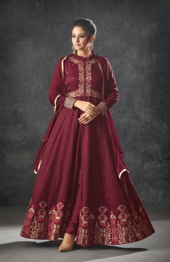 Give A Royal Look To Your Personality Wearing This Designer Floor Length Suit In Maroon Color. Its Top IS Silk Based Paired With Santoon Bottom And Chiffon Dupatta. All Its Fabrics Ensures Superb Comfort All Day Long. 