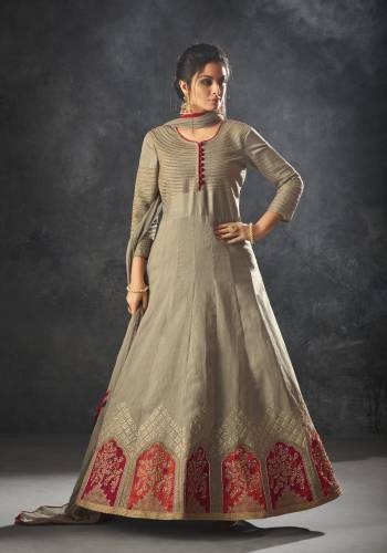 Flaunt Your Rich and Elegant Taste Wearing This Subtle Shade With This Designer Floor Length Suit In Grey Color. It Is Fabricated On Art Silk With Santoon Bottom And Chiffon Dupatta. Its Rich Fabric And Color Will Earn You Lots Of Compliments From Onlookers.