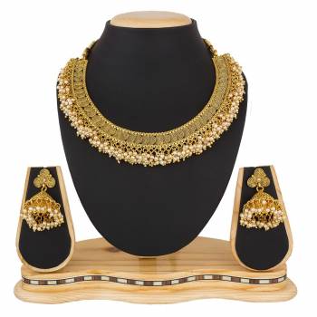 Add Glam To Your Attire Pairing It With This Lovely Set Of Necklace In Golden Color. This Can Be Paired With Any Colored Traditional Attire. Buy Now.