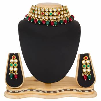 Give An Enhanced Look, Even To Your Simple Traditional Attire With This Beautiful Set Of Necklace In Golden Color. It Is Light In Weight And Can Be Carried Comfortably Throughout The Gala. Buy Now.