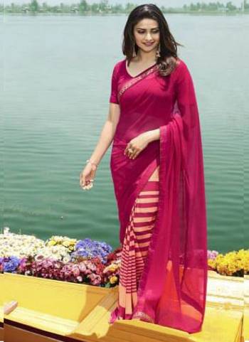 Look Attractive In This Lovely Dark Pink And Peach Color Paired With Dark Pink Colored Blouse. This Saree Is Fabricated On Georgette Paired With Art Silk Fabricated Blouse. 