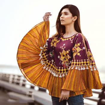 This Winters Go Colorful With This Beautiful Poncho Which Keeps Keeps You Warm As Well As Stylish. It Is Fabricated On Khadi And Can Be Paired with Any Kind Of Attire. Buy Now.