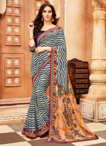 Grab This Beautiful Saree For Your Casual Or Semi-Casual Wear. This Saree Is Fabricated On Chiffon Georgette Paired With Soft  Silk Fabricated Blouse. It Is Light Weight And Easy To Carry All Day Long. 