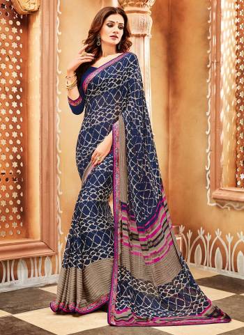 Here Is A Pretty Light Weight Saree Which Ensures You Superb Comfort For Casuals Or Semi-Casuals. This Saree Is Fabricated On Chiffon Georgette Paired With Soft Silk Fabricated Blouse. It Is Beautified with Prints All Over. 