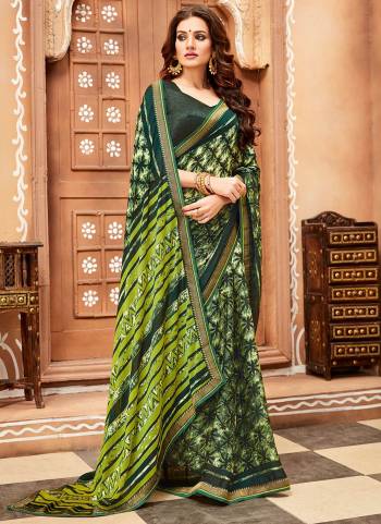 Grab This Beautiful Saree For Your Casual Or Semi-Casual Wear. This Saree Is Fabricated On Chiffon Georgette Paired With Soft  Silk Fabricated Blouse. It Is Light Weight And Easy To Carry All Day Long. 