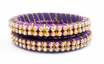 Add A Little More Glam To Look With This Beautiful Bangle Set Made With Resham Thread And Beautified with Stone Work. It Can Be Paired With Same Or Any Contrasting Colored Thraditional Attire. Buy Now.