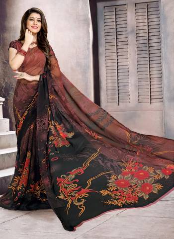 Add This Pretty Saree For Your Casual Or Semi-Casual Wear. This Saree and Blouse Are Fabricated On Georgette Beautified With Prints all Over It. 