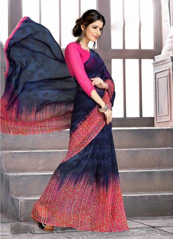 Have A Simple And Smart look With This Lovely Printed Saree Fabricated On Georgette. Its Fabric Is Soft Towards Skin And Ensures Superb Comfort All Day Long. 