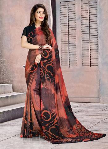 Have A Simple And Smart look With This Lovely Printed Saree Fabricated On Georgette. Its Fabric Is Soft Towards Skin And Ensures Superb Comfort All Day Long. 