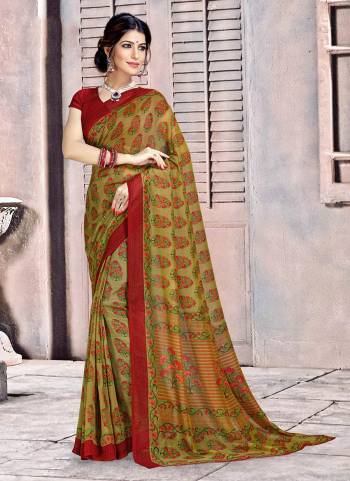 Add This Pretty Saree For Your Casual Or Semi-Casual Wear. This Saree and Blouse Are Fabricated On Georgette Beautified With Prints all Over It. 