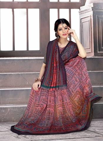 Have A Simple And Smart look With This Lovely Printed Saree Fabricated On Georgette. Its Fabric Is Soft Towards Skin And Ensures Superb Comfort All Day Long. 