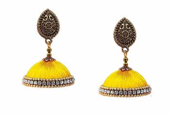 Grab This Beautiful Earrings Set In Jhumki Style Which Can Be Paired With Any Contrasting Or Same Colored Traditional Attire. Mixture Of Metal And Resham Thread Are Used To Make This Beautiful Earrings Beautified With Stone Work. 