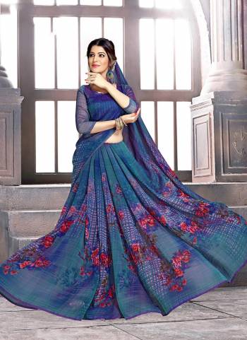 Add This Pretty Saree For Your Casual Or Semi-Casual Wear. This Saree and Blouse Are Fabricated On Georgette Beautified With Prints all Over It. 