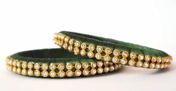 Add A Little More Glam To Look With This Beautiful Bangle Set Made With Resham Thread And Beautified with Stone Work. It Can Be Paired With Same Or Any Contrasting Colored Thraditional Attire. Buy Now