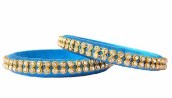 Add A Little More Glam To Look With This Beautiful Bangle Set Made With Resham Thread And Beautified with Stone Work. It Can Be Paired With Same Or Any Contrasting Colored Thraditional Attire. Buy Now