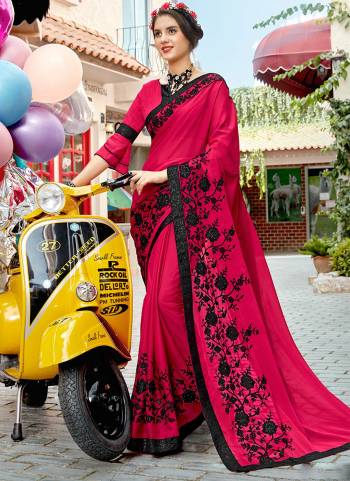 Shine Bright In This Lovely Rani Pink Colored Saree Paired With Rani Pink Colored Blouse. This Saree Is Fabricated On Georgette paired With Art silk Fabricated Blouse. It Has Heavy Resham Work With Tone To Tone Shade. 