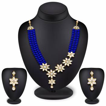 Grab This Very Pretty Designer Necklace Set Beautified With Colored Pearl And Stone Work, This Pretty Set Comes With A Set Of Earrings. Also It Can Be Paired With Any Same Or Contrasting Colored Traditional Attire. 