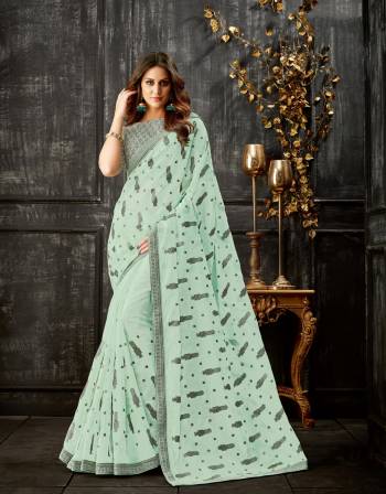 Exude sparkling freshness and crisp elegance in this simple yet stunning Aqua Blue saree. Dress Up with statement jhumkis or dress down with simple studs. 