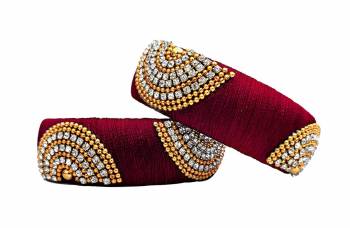 Add More Volume To Your Simple Bangles With Adding These Lovely Kada Bangles Made With Resham Thread And Beautified With Stone Work. Pair This Up Same Or Any Contrasting Colored Ethnic Attire.