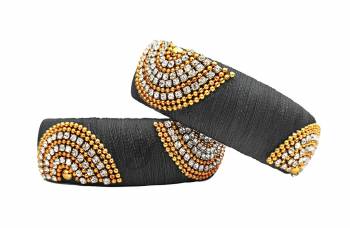 Grab This Lovely Pair Of Kada Bangles Which Can Be Paired With Any Bangles Or Can Simply Be Wore. These Bangles Are Made With Resham Thread And Stone Work, So It Is Light Weight And Easy To Carry All Day Long.