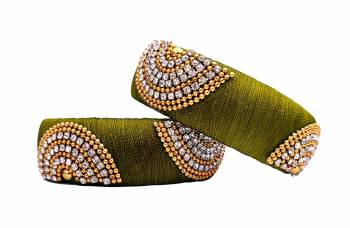 Grab This Lovely Pair Of Kada Bangles Which Can Be Paired With Any Bangles Or Can Simply Be Wore. These Bangles Are Made With Resham Thread And Stone Work, So It Is Light Weight And Easy To Carry All Day Long.