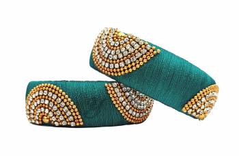 Add More Volume To Your Simple Bangles With Adding These Lovely Kada Bangles Made With Resham Thread And Beautified With Stone Work. Pair This Up Same Or Any Contrasting Colored Ethnic Attire.