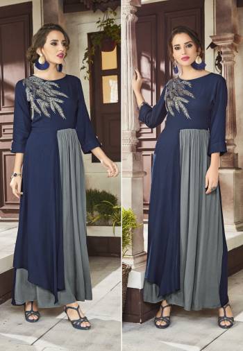 Here Is A New And Unique Patterned Designer Readymade Kurti In Navy Blue And Grey Color Fabricated On Viscose Rayon. This Kurti Is Beautified With Pretty Embroidery Over The Yoke. Buy Now.