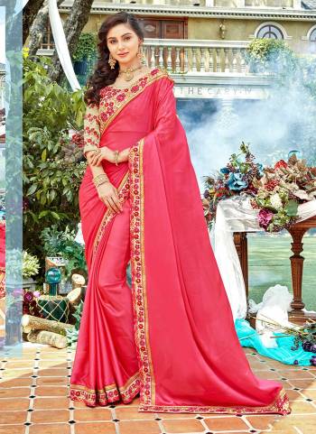 Shine Bright In This Designer Dark Pink Colored Saree Paired With Beige Colored Blouse. This Saree Is Fabricated On Satin Georgette Paired With Art Silk Fabricated Blouse. It Has Pretty Floral Work Over The Blouse And Saree Lace Border. 