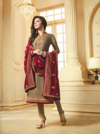 Rich And Elegant Looking Designer Straight Suit Is Here With Royal Color Pallete. This Suit Is In Beige Color Paired With Maroon Colored Dupatta. Its Top IS Fabricated On Georgette Satin Paired With Santoon Bottom And Georgette Dupatta. 