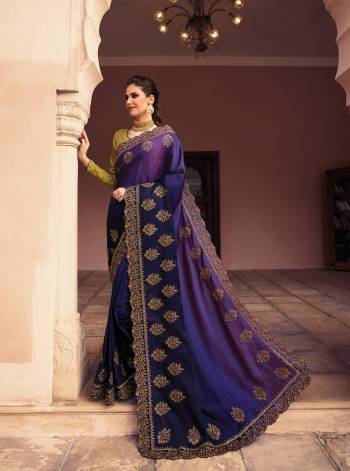 Grab This Designer Bright Colored Saree In Dark Purple Color Paired With Contrasting Pear Green Colored Blouse. This Saree Is Soft Silk Based Paired With Art Silk Fabricated Blouse. It Has Attractive Embroidery All Over. Buy Now.