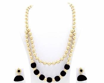 Grab This Beautiful Double Layered Necklace Set Made With Pearls And Resham Thread Balls. This Necklace Set Comes With A Pretty Pair Of Earrings, Pair This Up Any Same Or Contrasting Colored Ethnic Attire. Buy Now.