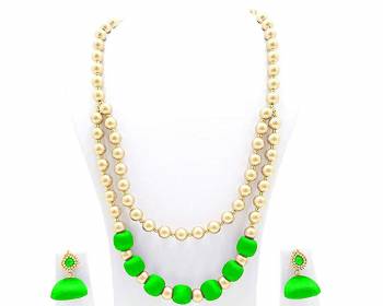 You Will Earn Lots Of Compliments With This Attractive Looking Necklace Set Made With Pearls And Resham Thread Balls. This Can Be Paired With Same Or Contrasting Colored Ethnic Attire. Also It Has A Pretty Pair Of Earrings Along.