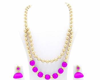 You Will Earn Lots Of Compliments With This Attractive Looking Necklace Set Made With Pearls And Resham Thread Balls. This Can Be Paired With Same Or Contrasting Colored Ethnic Attire. Also It Has A Pretty Pair Of Earrings Along.