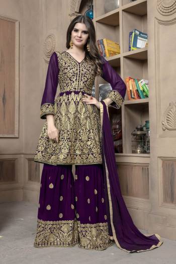 Here Is A Designer Sharara Dress In Wine For This Wedding And Festive Season.Its Top And Bottom Are Georgette Based Paired With Chiffon Fabricated Dupatta. Both Its Top And Bottom Are Beautified With Heavy Jari Embroidery And Stone Work. Buy This Semi-Stitched Suit Now.