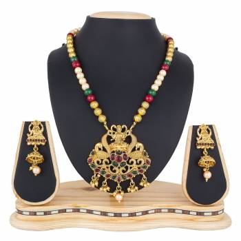 Add This Pretty Heavy Necklace Set In Golden Color. This Lovely Set Comes A Pair Of Earrings . It Can Be Paired With Any Colored Traditional Attire. Buy Now.