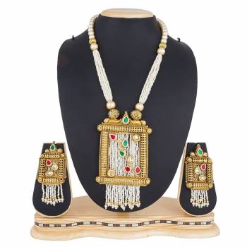 Add This Pretty Heavy Necklace Set In Golden Color. This Lovely Set Comes A Pair Of Earrings . It Can Be Paired With Any Colored Traditional Attire. Buy Now.