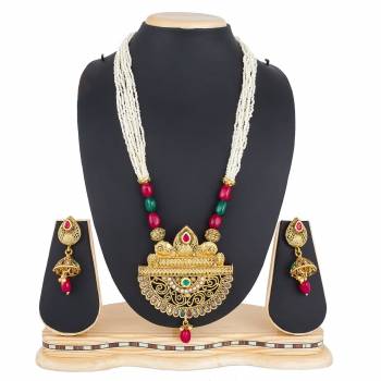 Add This Pretty Heavy Necklace Set In Golden Color. This Lovely Set Comes A Pair Of Earrings . It Can Be Paired With Any Colored Traditional Attire. Buy Now.