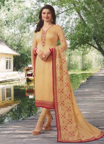 Rich And Elegant Looking Designer Straight Suit Is Here With Royal Color Pallete. This Suit Is In Beige Color Paired With Beige Colored Dupatta. Its Top IS Fabricated On Georgette Satin Paired With Santoon Bottom And Georgette Dupatta. 