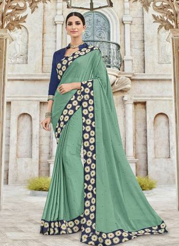 Vibrant and visually appealing, this Mint green color two tone bright georgette saree. Ideal for party, festive & social gatherings. this gorgeous saree featuring a beautiful mix of designs. Its attractive color and designer heavy embroidered design, designer beautiful heavy blouse, beautiful floral design work over the attire & contrast hemline adds to the look. Comes along with a contrast unstitched blouse.