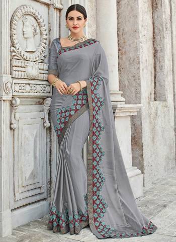 You Look elegant and stylish this festive season by draping this grey color two tone bright Chiffon saree. Ideal for party, festive & social gatherings. this gorgeous saree featuring a beautiful mix of designs. Its attractive color and designer heavy embroidered design, Flower patch design, stone design, beautiful floral design work over the attire & contrast hemline adds to the look. Comes along with a contrast unstitched blouse.